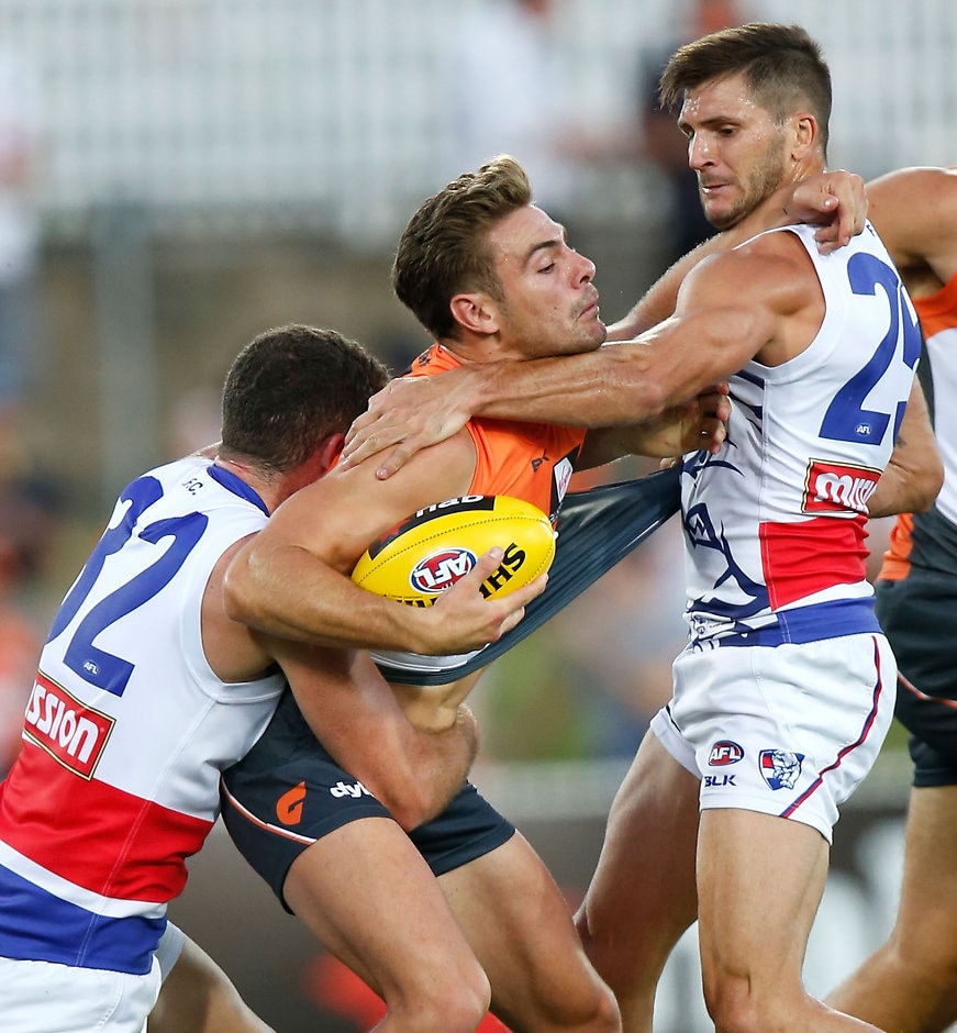 AFL 2016 NAB Challenge - GWS Giants v Western Bulldogs Giants stand-in skipper Stephen Coniglio feels the heat from the Dogs in Canberra - ${keywords}